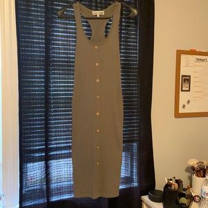 Long fitted buttoned down dress.